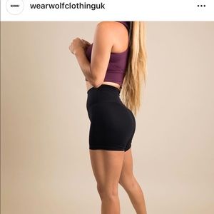 Wear wolf clothing , black and gray spandex shorts